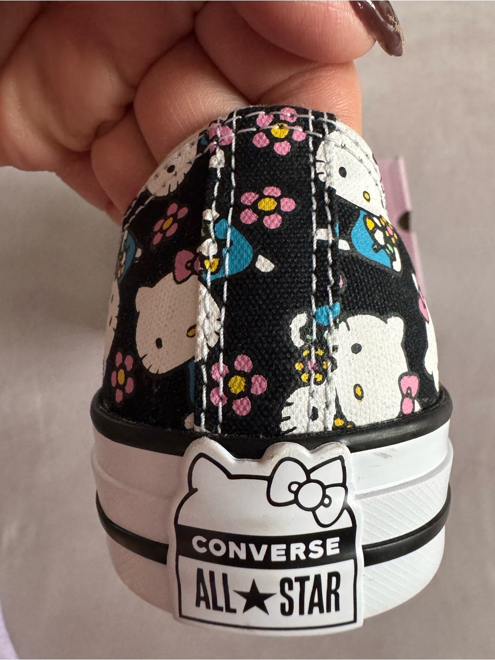 Converse Black Hello Kitty Floral Low-Top Sneakers with Pink & Blue Accents - Picture 11 of 11